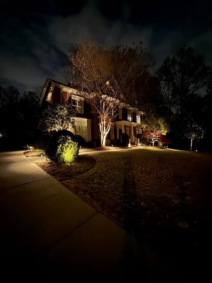 Driveway approach to The Whitney Sanctuary at night